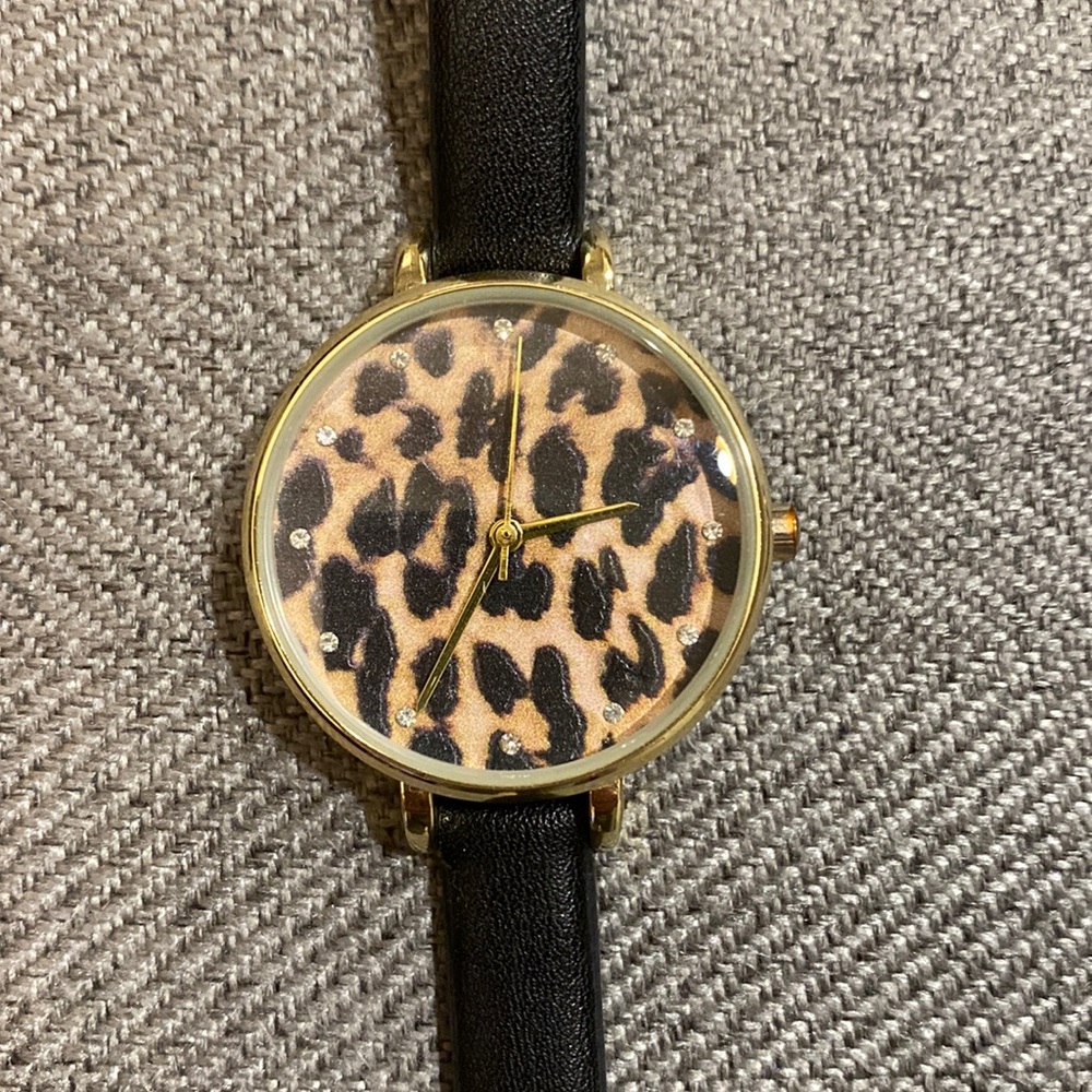 Cheetah, gold and black watch